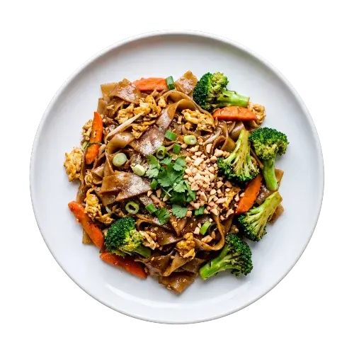 Pad See Ew — wide rice noodles stir fried with egg, broccoli and carrots
