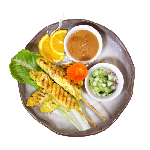Chicken satay skewers with peanut sauce and cucumber relish