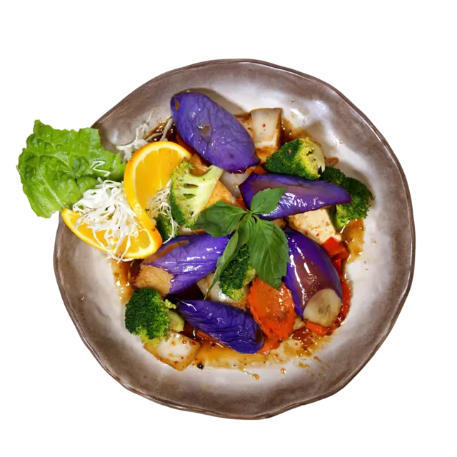 Sweet eggplant stir-fry with Thai eggplant, tofu, broccoli, carrot and fresh basil
