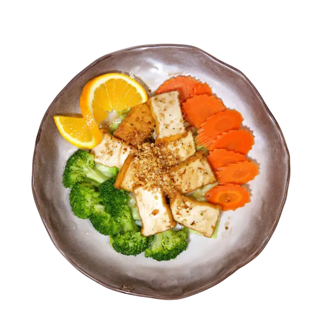Garlic tofu topped with crisp fried garlic, served with steamed broccoli and carrots