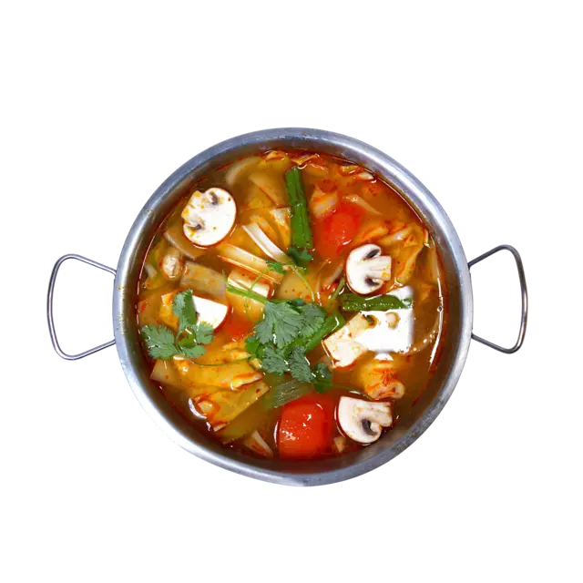 Tom Yum — spicy and sour Thai soup with mushrooms, tomato, lemongrass and tofu, served in a hot pot