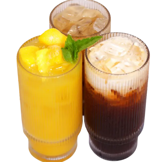 Three Thai drinks side by side — fresh mango juice with mint, iced tea, and Thai iced coffee layered with cream
